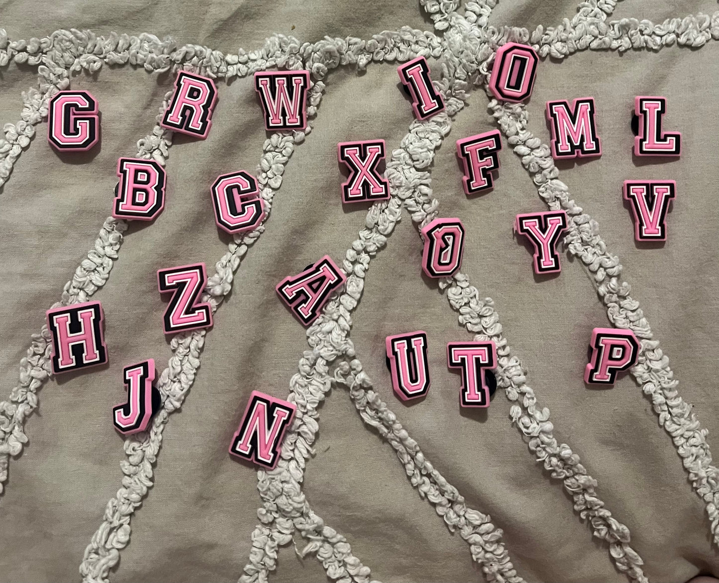 Pink letter croc charms