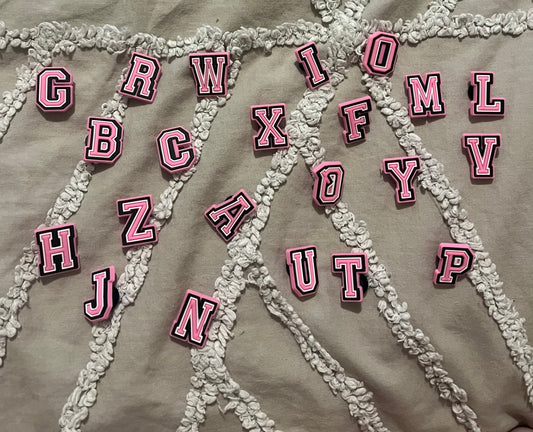 Pink letter croc charms